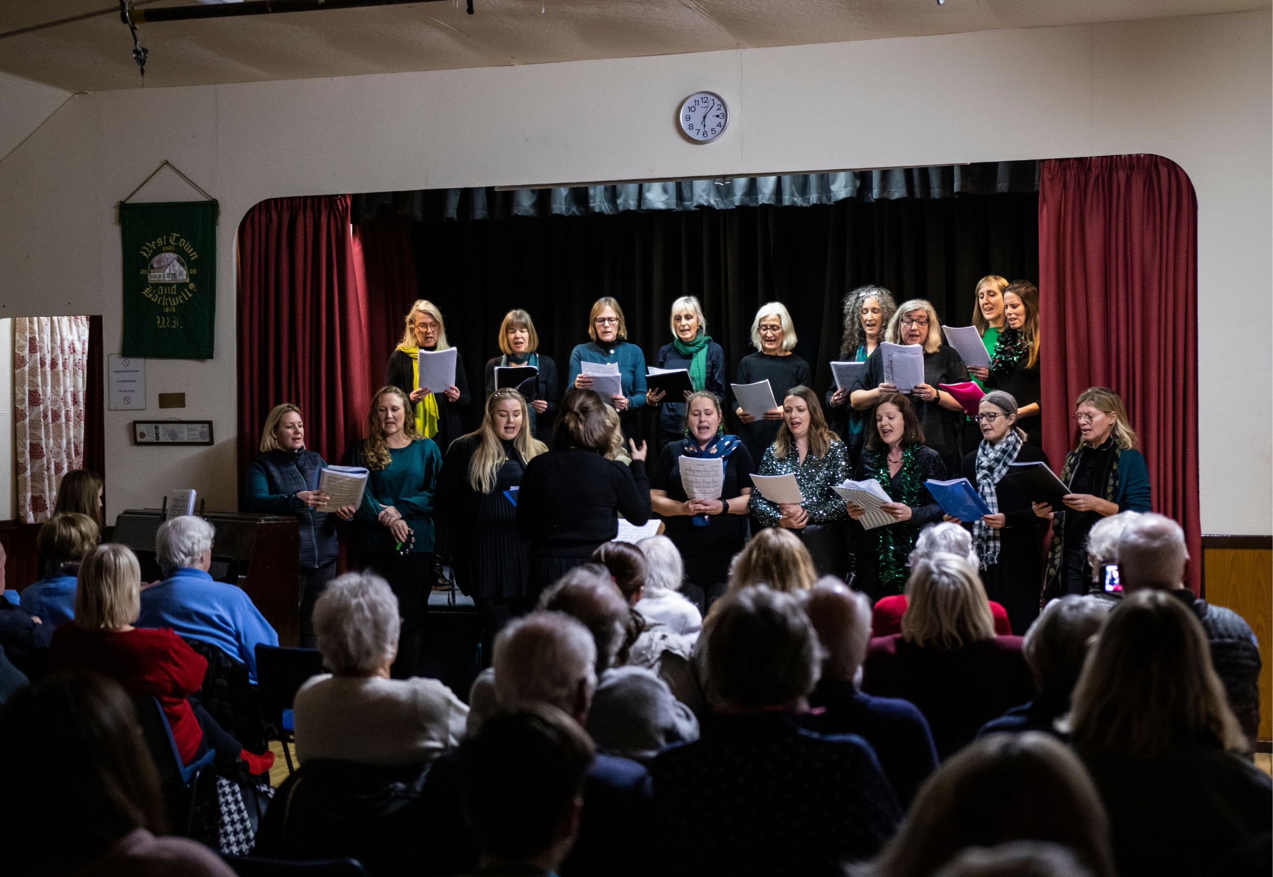 A choir singing at the 2022 BRACE Christmas Concert.