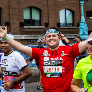 Liam Running over Tower Bridge at the TCS London Marathon 2024