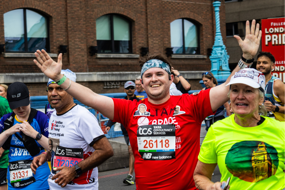 Liam Running over Tower Bridge at the TCS London Marathon 2024